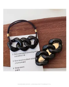 Stylish black chain hair tie and hair clip set, simple elegant design for women and girls daily wear.