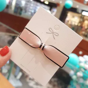 Korean style bow acrylic hair clip for women, elegant side hair pin for daily sweet wear.