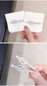 Rhinestone geometric hair clip, Korean minimalist hair accessory, sparkling crystal hairpin detail view.