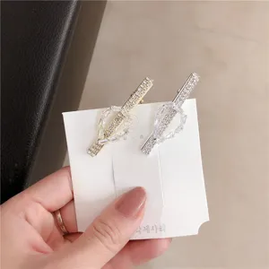 Elegant rhinestone geometric hair clips set in gold and silver finish. Perfect for daily wear.