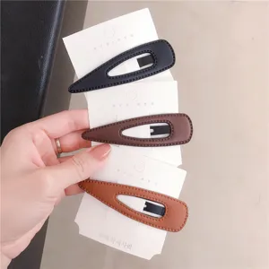 Minimalist leather teardrop hair clips set, elegant side bangs clip accessories for women.