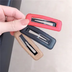 Korean minimalist rectangular snap hair clips set, solid color leather wrapped side clips.