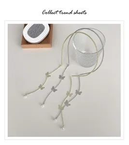 Details of pearl butterfly tassel headband, chic French vintage hair accessories for women.