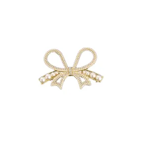 Elegant pearl and rhinestone bow hair clip, stylish hair accessory for women daily wear.