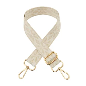 Adjustable embroidered wide bag strap replacement strap with gold hardware for crossbody bags.