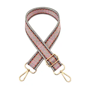 Sangle de sac ethnique tissée, bandoulière réglable de 3.8cm de large avec quincaillerie dorée.