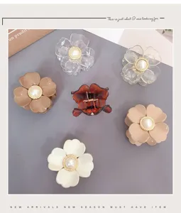 Cute acrylic flower hair claw clip with pearl center, small shark clip for women and girls daily styling.