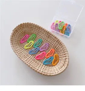 Cute colorful heart hair clips set with a storage box and woven basket for kids and girls.