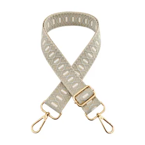 Adjustable replacement bag strap with chic geometric jacquard embroidery and gold hardware for crossbody bags.