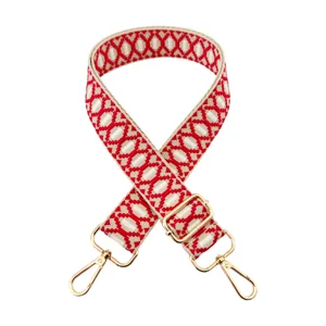 Close-up detail of the adjustable red white jacquard woven replacement bag strap metal hardware