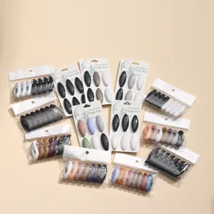 Detailed view of colorful plastic hijab pins with rhinestones, various pack color sets.