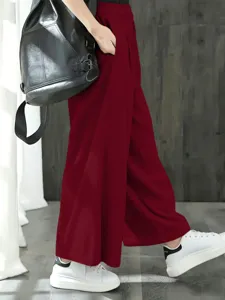Pantalon large taille haute pour femme, doté d'une taille élastique confortable pour un style chic.
