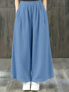 Vue détaillée de pantalon large taille haute décontracté pour femme, taille élastique.
