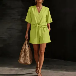 Lime green V-neck short sleeve button down top and shorts set casual summer outfit for women.