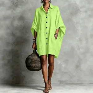 Oversized lime green cotton linen shirt dress with batwing sleeves for casual summer wear.