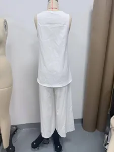 Summer casual women white sleeveless V-neck vest and wide leg pants two piece set detail.