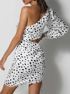 Detailed view of women sexy one-shoulder long sleeve cutout bodycon dress with print.