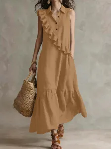 Detail view of the elegant sleeveless lapel long dress with ruffle trim in rich brown.