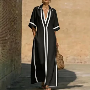 Abito lungo maxi nero e bianco con revers scollo a V, vestito elegante casual da donna.