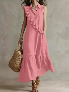 Close-up detail of the elegant pink sleeveless ruffle dress, showcasing fine fabric texture and layers.