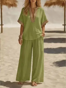 Casual olive green women two-piece set, V-neck top and wide-leg pants for summer.