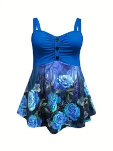 Modisches blaues Tankini-Oberteil mit Blumenmuster, Knöpfen und feinem Rüschensaum.