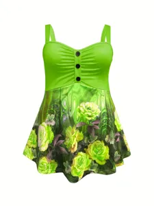 Grünes florales Camisole-Top Detailansicht mit Frontknöpfen und Plissee-Design.