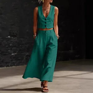 Completo elegante da donna gilet in lino e pantaloni larghi outfit casual verde due pezzi
