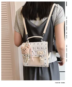 Stylish mini women backpack with cute bear pendant and bow detail, perfect for summer.