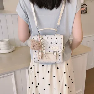 Sweet style women backpack with cute bear pendant and bow detail, stylish daily shoulder bag.