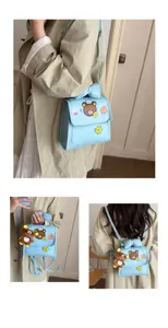 Leuke cartoon beer strik kinderen rugzak blauw PU leer meisjes schooltas tas details
