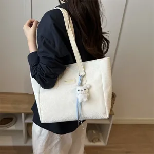 Femme sac cabas en cuir blanc grande capacité sac à épaule fourre-tout décontracté avec pendentif.