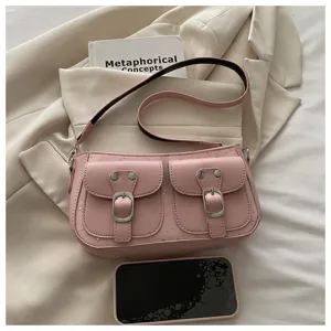 Sac à épaule vintage rose pour femme, élégant sac baguette avec poches et boucles en métal.