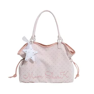Pink polka dot canvas tote bag, large capacity casual shoulder bag with cute star charm.