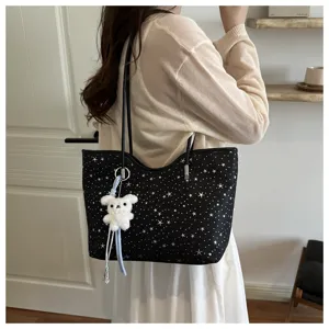Korean fashion star pattern shoulder tote bag for women with cute bear pendant detail.