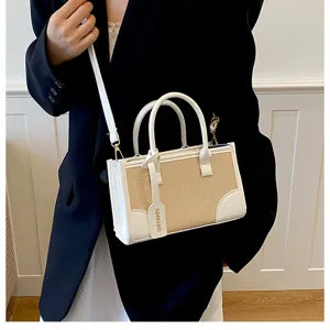 Elegante bolso de mano de paja y cuero para verano, con asas dobles y correa ajustable cómoda.