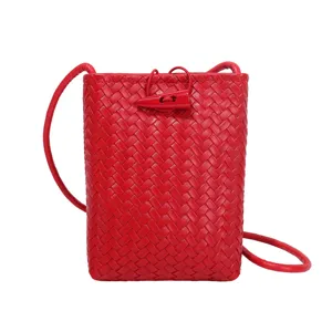 Red woven leather mini crossbody bag for women, stylish phone bag with chic closure.