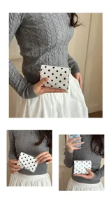 Stylish polka dot clutch bag for women, chic minimalist commuter small square bag fashion accessory.
