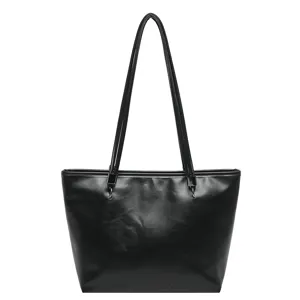 Borsa shopper nera minimalista in ecopelle da donna, capiente borsa a spalla elegante.