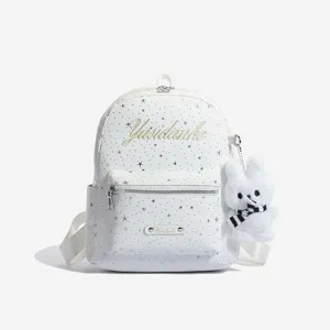 Detail view of the Korean style white star sequin backpack with cute plush bunny keychain charm.