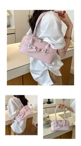 Roze PU lederen schoudertas met stijlvolle riemgesp detail, retro onderarmtas voor dames.