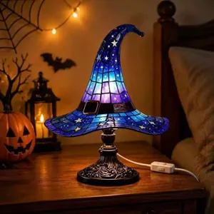 Stained glass witch hat table lamp, Halloween decorative night light with blue mosaic design.