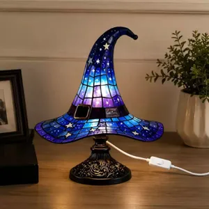 Handcrafted stained glass witch hat table lamp detail, glowing night light decor.
