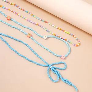 Set di catene da vita in perline colorate con ciondoli di fiori smiley per la moda estiva