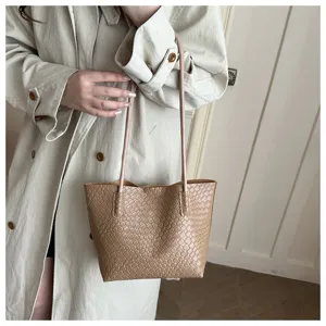 Woven tote bag for women, large capacity shoulder bag, stylish casual PU leather handbag.