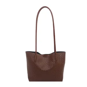 Brown woven shoulder bag for women, large capacity stylish casual tote purse main view.