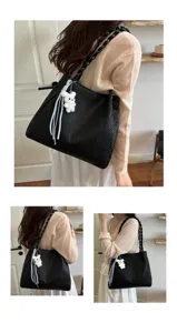 Women's large capacity black woven shoulder tote bag with cute plush rabbit charm daily use.