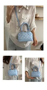 Chic light blue polka dot dome handbag, stylish shoulder crossbody bag for women daily wear.