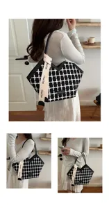 Gedetailleerd overzicht van stijlvolle zwart-witte tweed shopper tas voor dames.