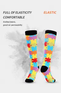 Detailed view of colorful jigsaw puzzle pattern compression sports socks with high elasticity.